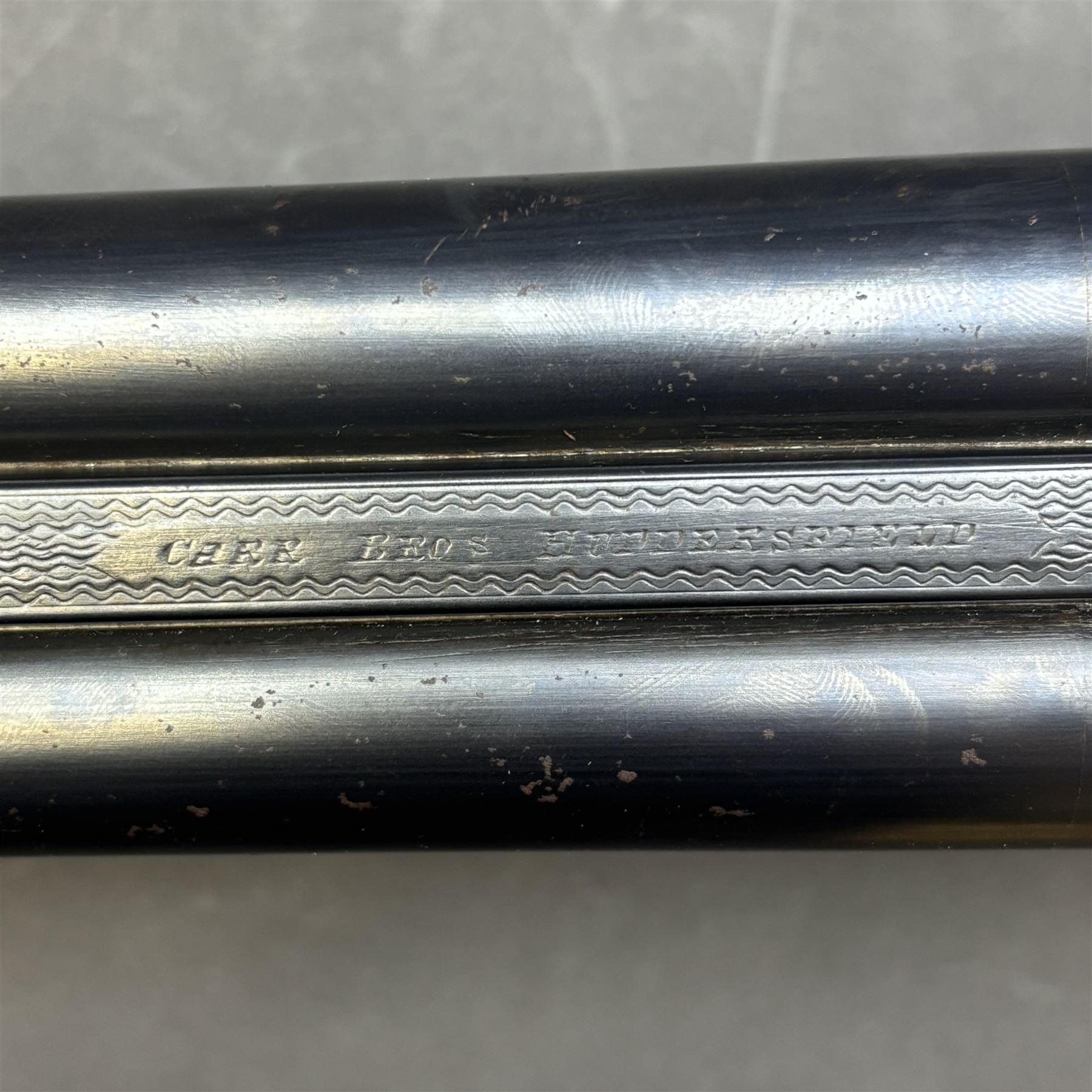 Carr Brothers of Huddersfield 12 bore side by side shotgun with engraved sidelock plates, trigger guard, underside, top plate, thumb lever and fences, chequered semi-pistol grip and horn tipped forend, vacant cartouche to the underside of the stock, double trigger and named 28 inch sleeved barrels choked ¾ and ½, overall length 113cm SHOTGUN CERTIFICATE REQUIRED
