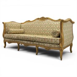 Louis XV design giltwood framed settee, the frame with applied foliate detail,  three loose seat cushions, upholstered in pineapple patterned fabric