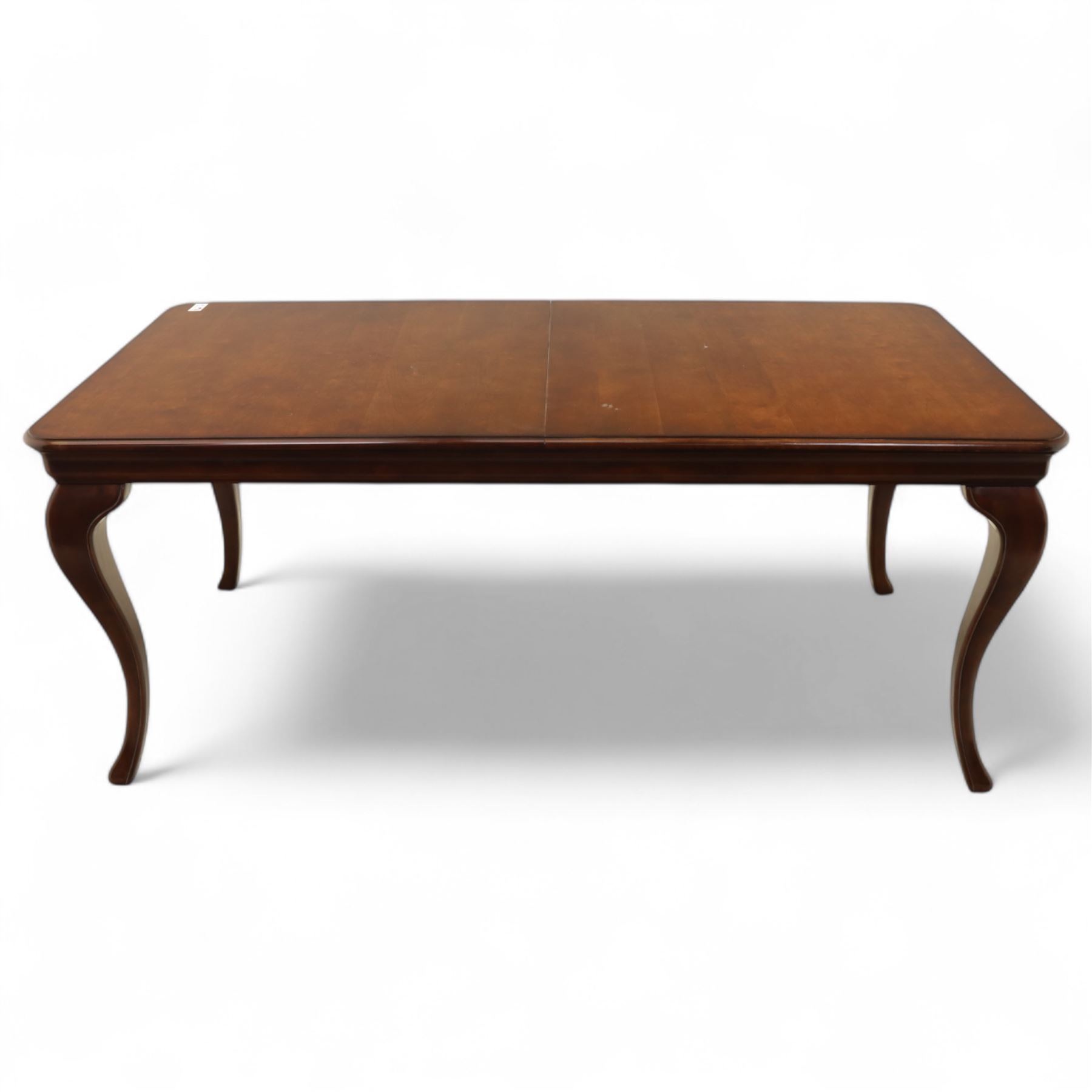 Willis & Gambier - mahogany extending dining table, rectangular top with rounded corners on cabriole legs, with two 35cm extension leaves, four Willis & Gambier upholstered high back chairs and four mahogany chairs, upholstered in a stripped multi-coloured velvet fabric, with scroll-shaped top rail, lyre-shaped back splat on cabriole legs, chairs W46xD91x97cm (11) 