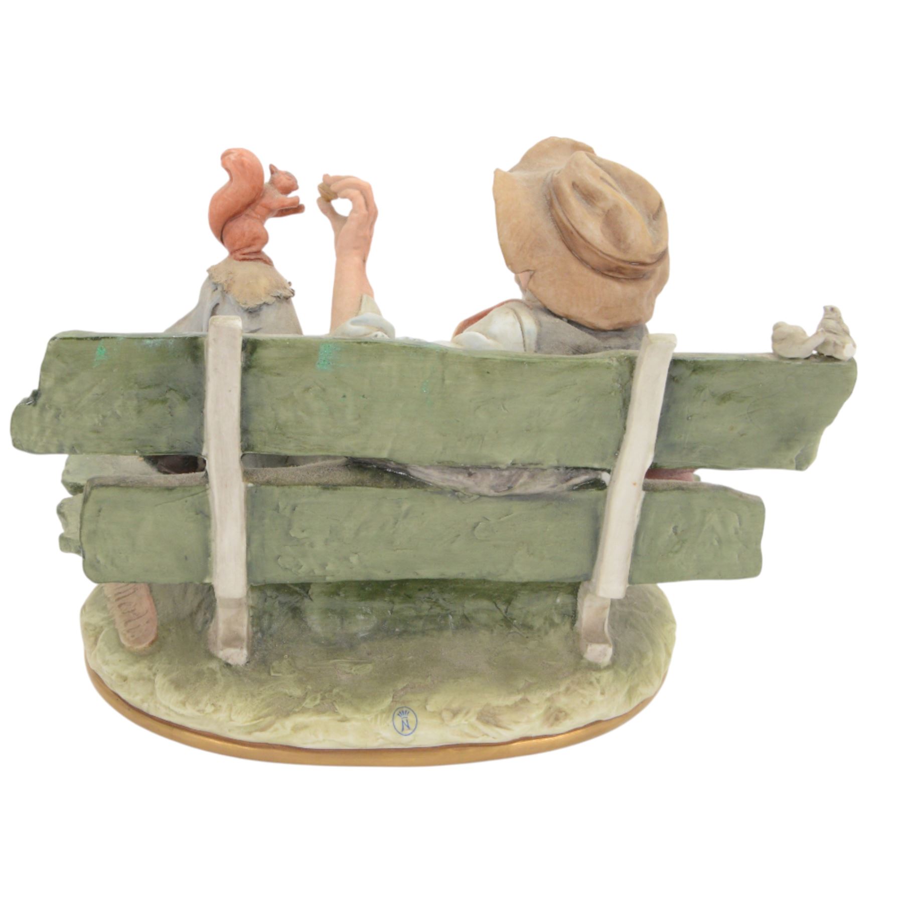 Three Capodimonte figures, including Male artist, Tramp on a Bench, and Boy Fishing, largest H35cm