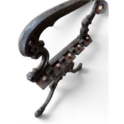Carron Foundry - two pairs of 19th century cast iron garden bench ends, ornate detail with arms and X shaped legs,finish in black paint, the design no. 110396, first registered 13 July 1857 (see illustration), width as desired
