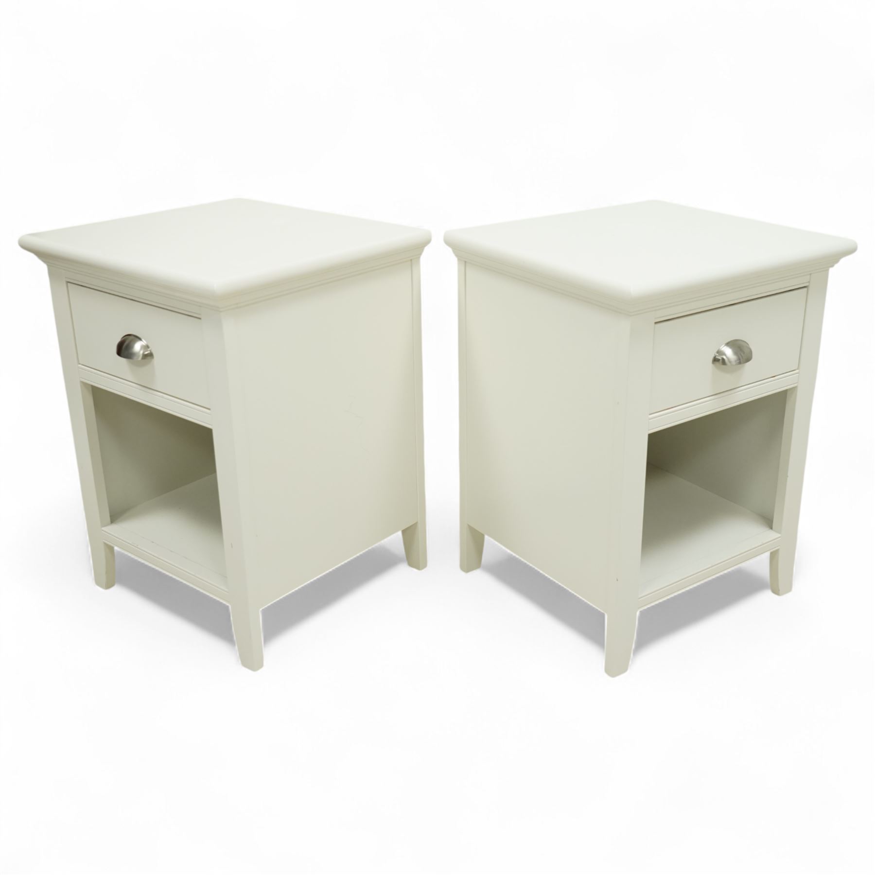 Barker & Stonehouse - pair of Carrington white bedside chests, each with moulded rectangular top over single drawer with brushed steel cup handle, open shelf below, on bracket feet