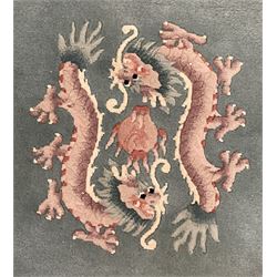 Chinese jade ground woollen rug decorated with dragons 