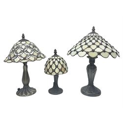 Three Tiffany style table lamps, tallest H41cm 