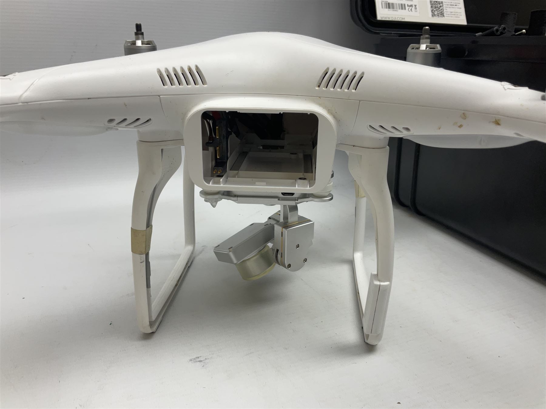 DJI Phantom 2 Vision Plus 3.0 drone, with controller, battery pack, blades, chargers and other accessories in fitted foam lined hard plastic case