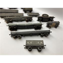 '0' gauge - fifteen early 20th century scratch-built wooden and metal goods wagons including open and flat-bed wagons, cable drum wagon etc; together with four wagon chassis and quantity of spare parts and wheels