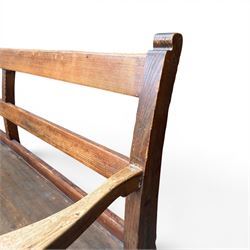 Early 20th century pine and oak bench seat, stained pine rail back frame with shaped oak arms