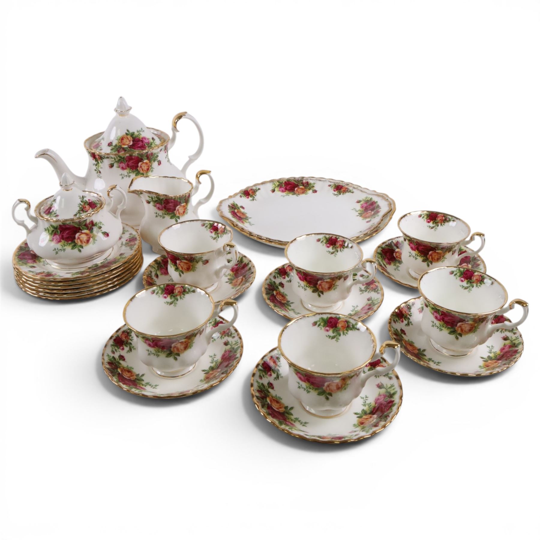 Royal Albert Country Rose tea service for six, comprising teapot, milk jug, covered sucrier, dessert plates, two sandwich plates, cups and saucers 