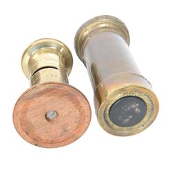 Early 20th century moneyboxes, including trench art example, Bakelite example with applied West Africa Two Shilling coin engraved 'Joan', three brass pot boxes and a wooden ebonised example with brass mounts, tallest H15cm