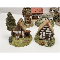 Sixteen Lilliput Lane models from the European collections, to include Dutch Collection; Aan de Amstel, Wipmolen, French Collection; Cabane De Guardian La, Porte Sachoenenberg La, German Collection Alte Schmiede, Das Rathaus, etc some with original boxes and deeds 