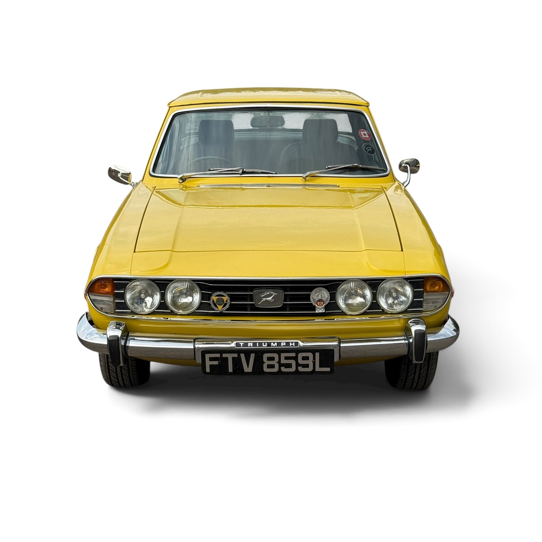 1973 Triumph Stag Mk II 3.0 V8 Manual with Overdrive

Registration: FTV 859L
Date of first registration: 8th March 1973
Recorded mileage: approximately 50,000 miles
Engine: 2,997cc petrol V8
Transmission: four-speed manual with overdrive

An attractive manual-overdrive example of Triumph’s celebrated V8 grand tourer, finished in yellow and supplied with both a removable hardtop and folding soft top.

The car has been the subject of extensive restoration and mechanical work, supported by a large history file containing invoices, notes and photographs documenting the work undertaken. The accompanying records indicate that the engine was rebuilt at approximately 36,000 miles, including re-boring of the block, checking and machining of the top faces, and steam cleaning following machining.

Further work and replacement parts are understood to include an upgraded radiator, electric cooling fan, Stag Webber header tank kit, complete set of cooling hoses and clips, fuel pump and filters, alternator, distributor cap, HT leads, spark plugs, front brake calipers and hoses, rear brake cylinders, tyres, front lights and LED bulbs. Various seals, interior trim items and seat components have also reportedly been renewed.

The car is believed to have been dry-stored from 1994 until 2017, with a substantial programme of recommissioning and improvement subsequently undertaken between 2017 and 2023. The history file also includes earlier MOT certificates dating from 1988 to 1994.

Offered with its V5C, hardtop, soft top, extensive restoration and maintenance history, photographic record and a quantity of useful spare parts, including a new dashboard veneer set.