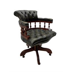 Captain's swivel desk chair, upholstered in studded green leather