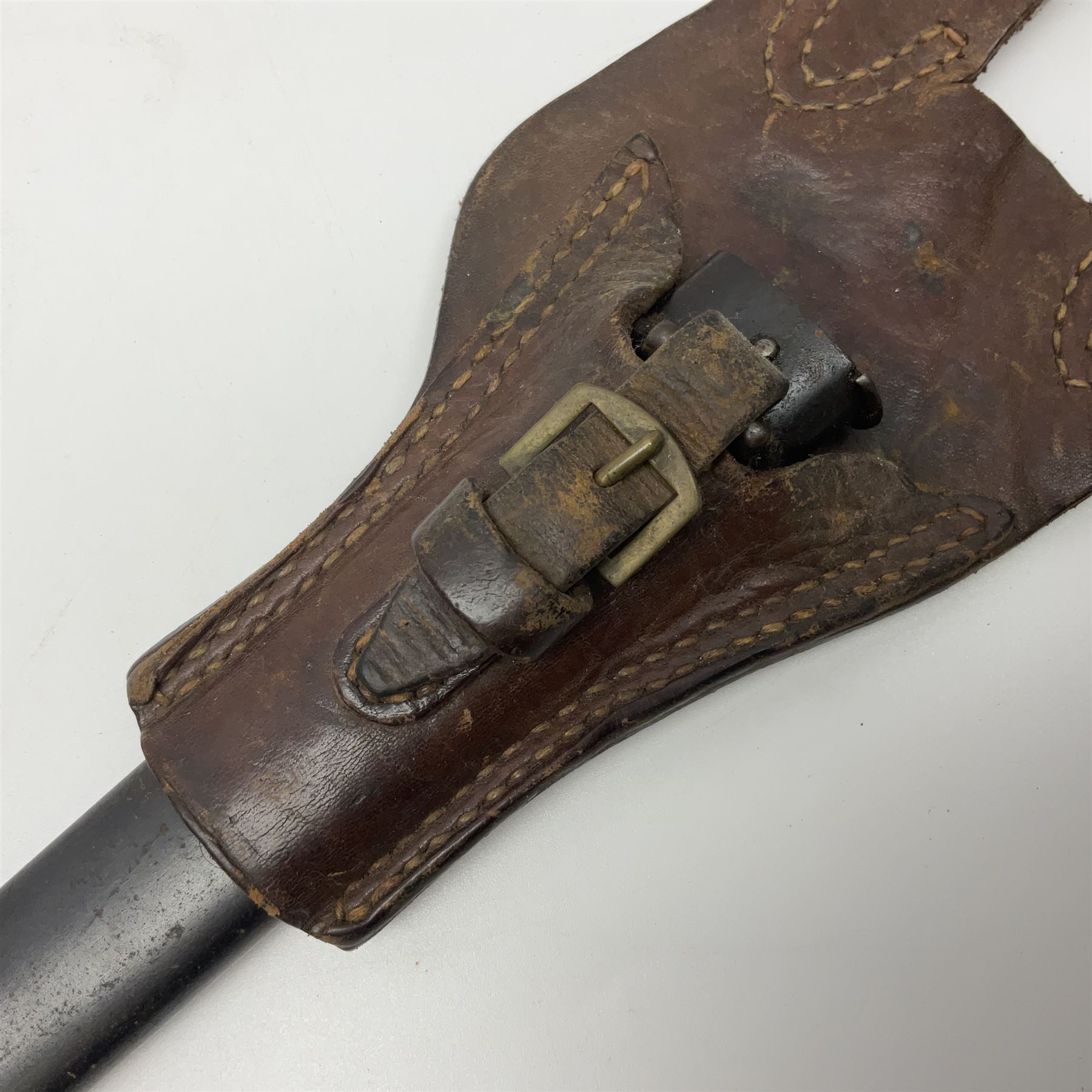 French Model 1892 Mannlicher Berthier bayonet with 39.5cm fullered blade; in metal scabbard with leather frog L54cm overall; and French Model 1874 epee bayonet (no scabbard) (2)