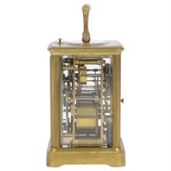 French- late 19th century 8-day  twin train corniche carriage clock with hour repeat and alarm, four bevelled glass panels and oval inset viewing glass to the top, enamel dial with Roman numerals, minute markers and fine moon hands, with alarm setting dial and indistinct London retailers name, movement with original jewelled and silvered lever platform escapement and rack striking, sounding the hours and alarm on a single rear mounted bell. With key.