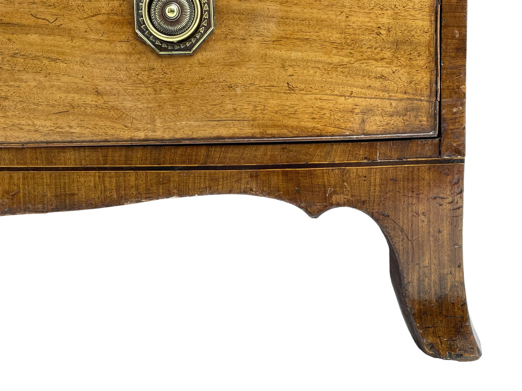 George III inlaid mahogany bow-front chest, fitted with four graduating drawers, octagonal plate and loop handles, shaped apron and splayed bracket feet