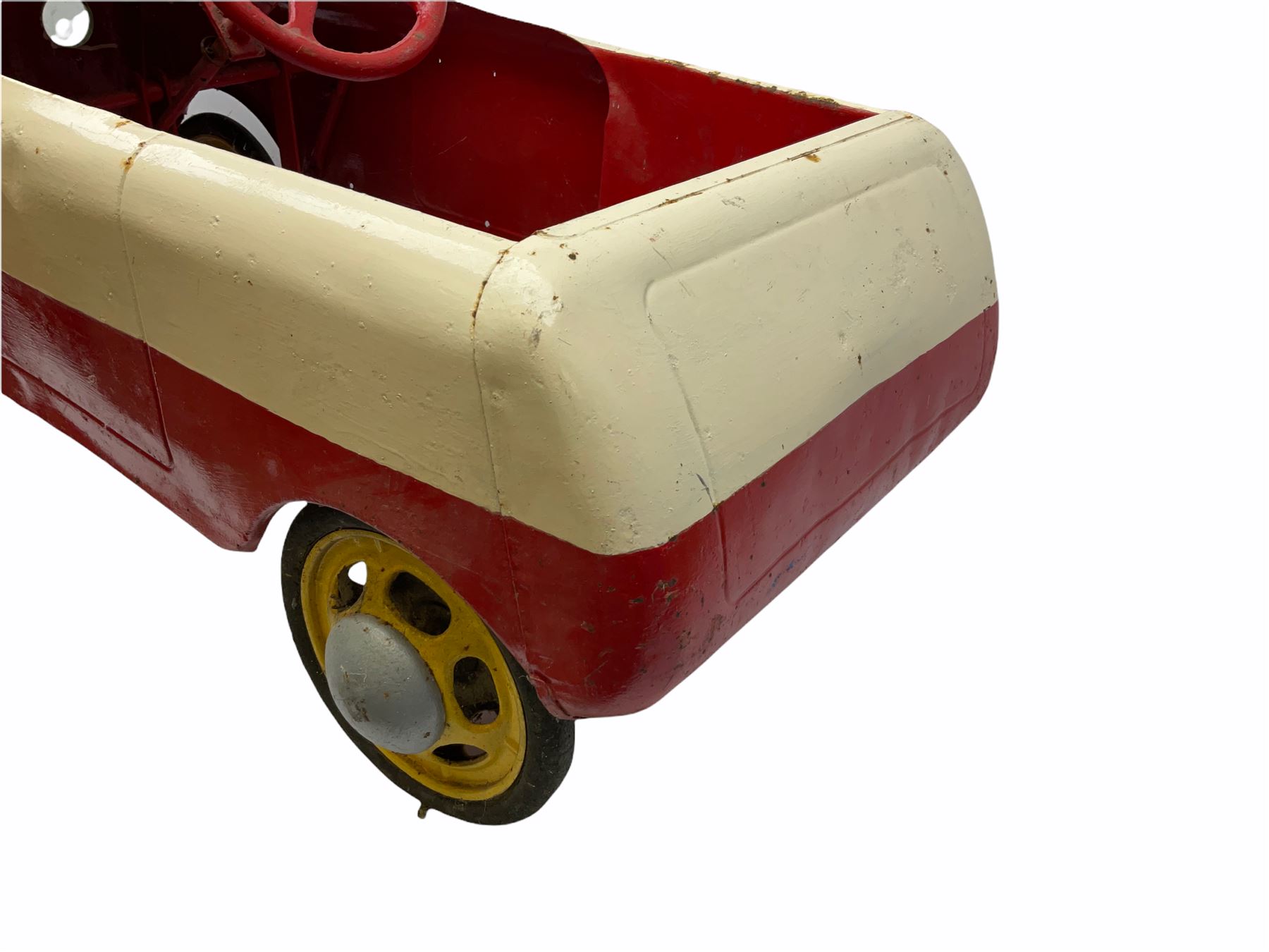1950s child's tin-plate pedal car, possibly by Tri-ang, painted white and red and named 'Crusader' L104cm
