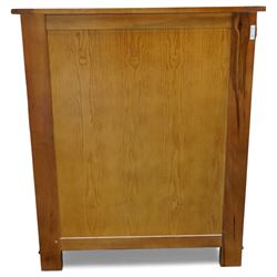 French cherry wood chest of drawers, rectangular moulded top above five long drawers with brass swing handles, flanked by reeded corner panels, raised on turned bun feet