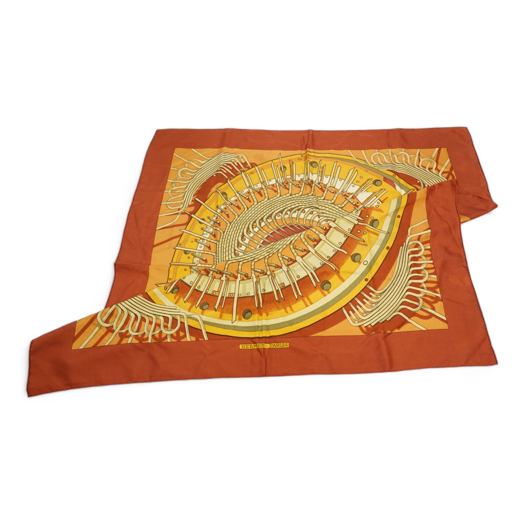 Hermes 'Alternateur' silk scarf in brown and ochre colourway