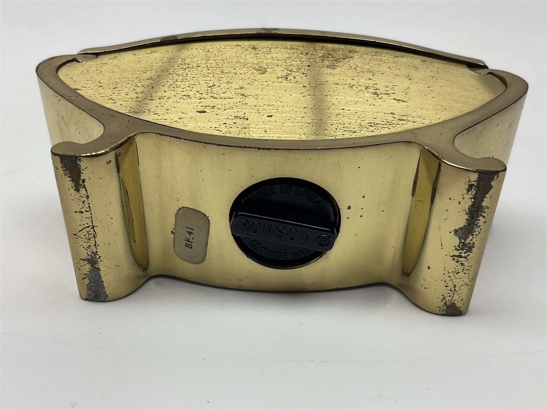 Ronson gilt metal table lighter, together with a silver-plate table lighter in the form of a football boot