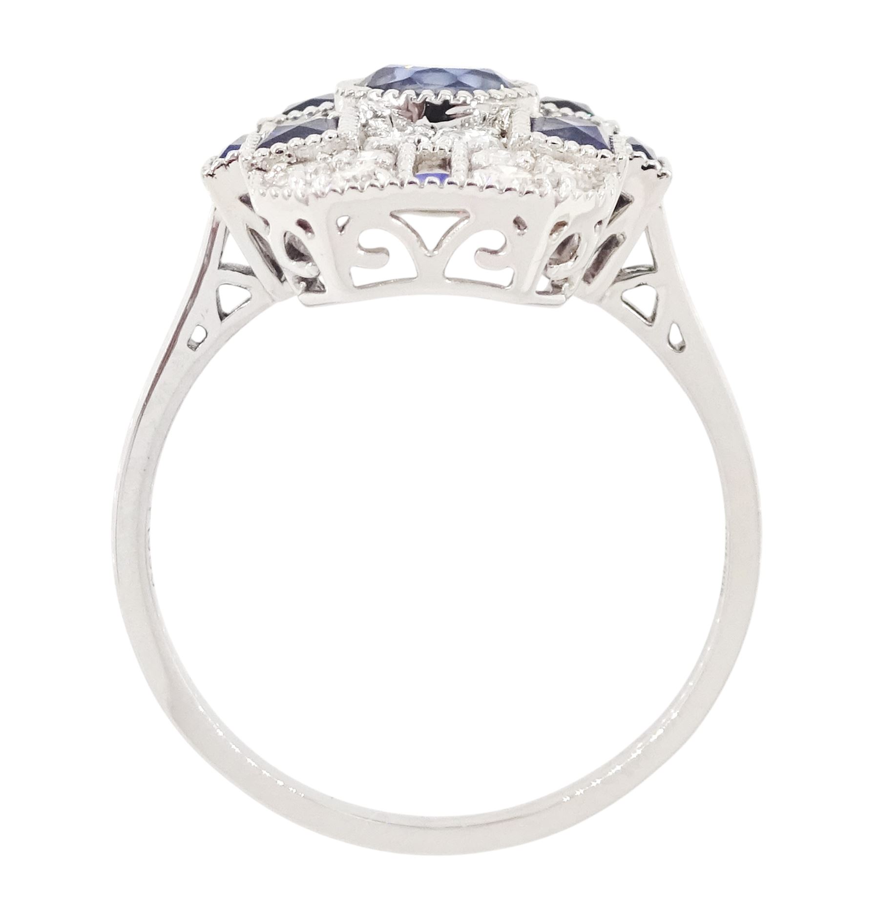 Platinum sapphire and diamond panel ring, milgrain set with round and calibre cut sapphires and round cut diamonds, stamped Pt 950, total sapphire weight 0.87 carat, total diamond weight 0.46 carat