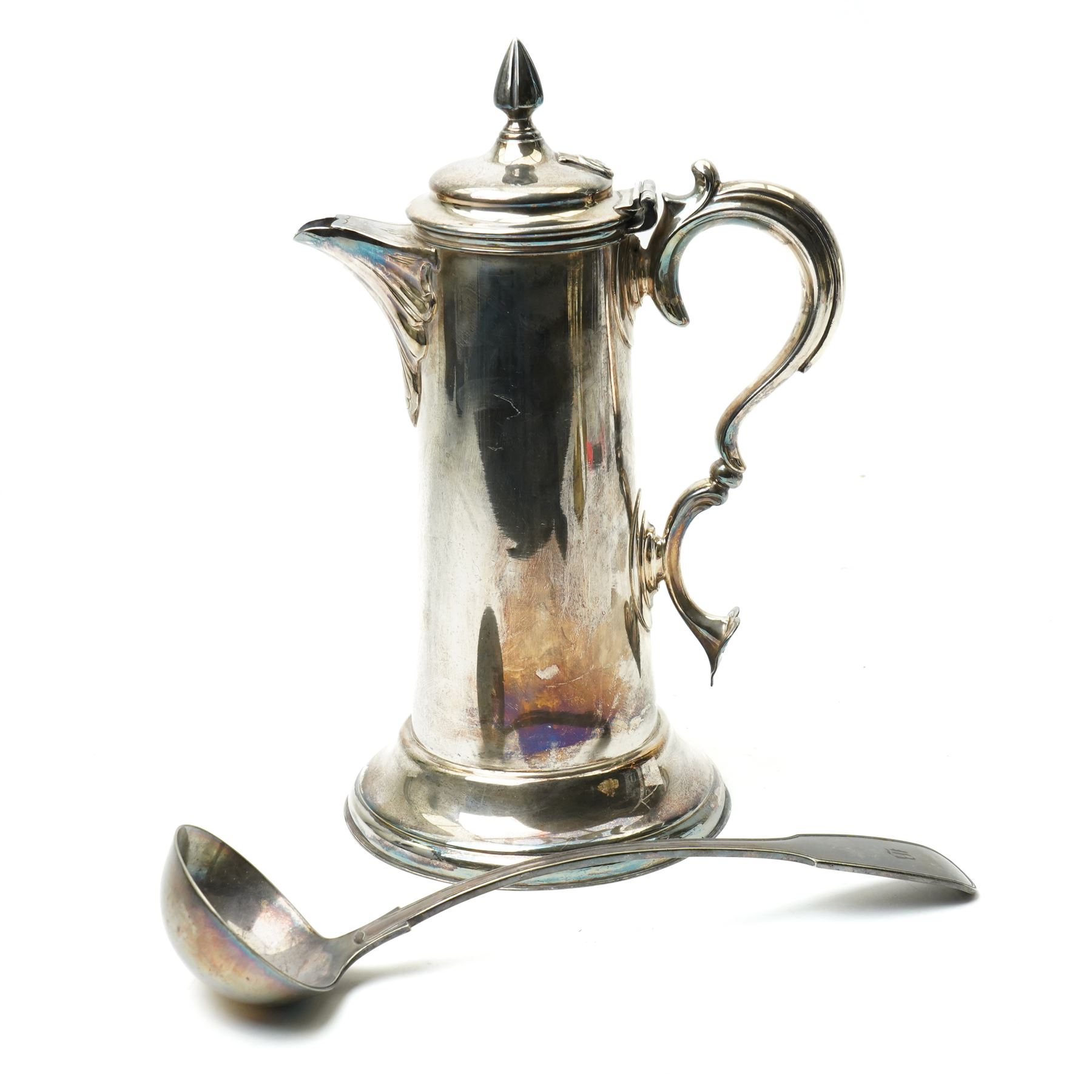 Britannia metal flagon by James Dixon & Sons with scroll handle and hinged lid H35cm and a silver plated fiddle pattern soup ladle (2)