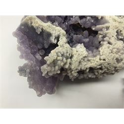 Grape agate cluster, formed of spherical quartz crystals, in purple and blue/grey tones, H8cm, L25cm