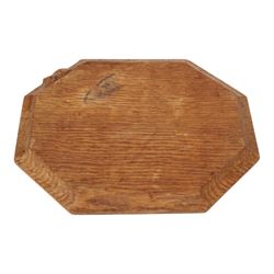 Mouseman - oak chopping board, of canted octagonal form, with carved mouse signature, by the workshop of Robert Thompson of Kilburn
