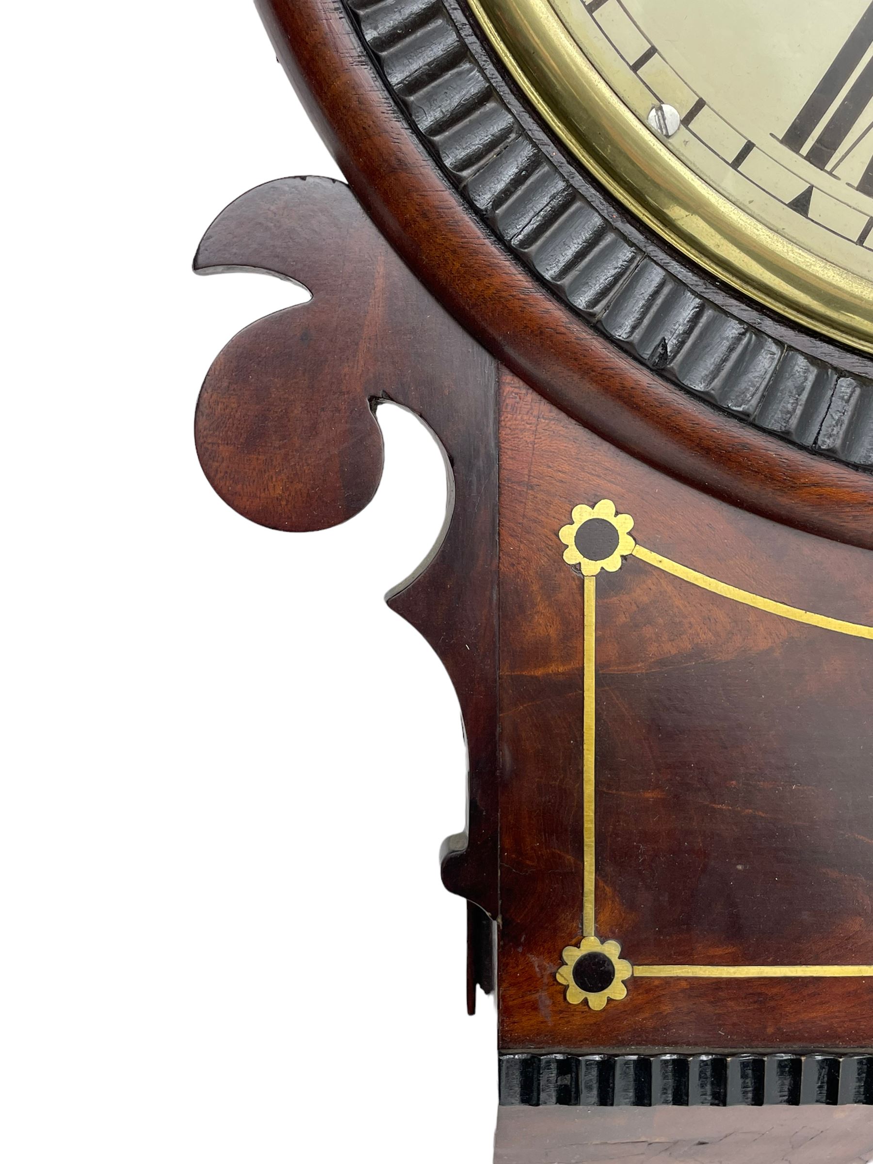 Frodsham of London - 8-day chain driven twin fusee wall clock in a mahogany case c1870, veneered case inlaid with brass stringing and motifs, shaped earpieces and chisel shaped base with pendulum adjustment door, 10” painted steel dial with Roman numerals, minute track and blued serpentine steel hands, dial inscribed Frodsham, Gracechurch Street, London, chain fusee, five-pillar, rack striking movement striking the hours on a cast bell. With pendulum.
H65 W34 D18
George Edward Frodsham, son of John Frodsham is recorded as working in Gracechurch Street, London 1869-79. Succeeded to Frodsham & Baker
