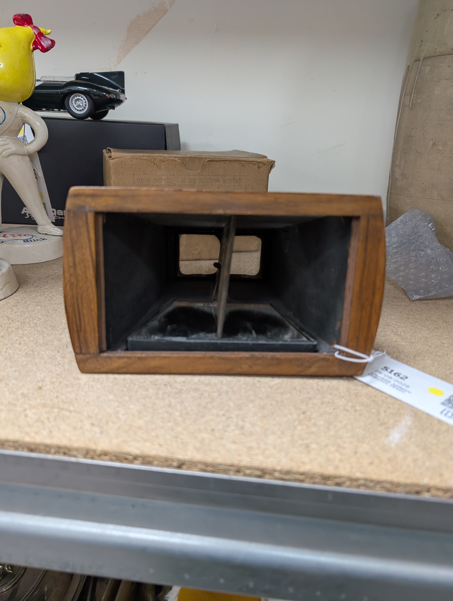 Victorian walnut stereoscope and a collection of slides, including travel, street scenes and landmarks