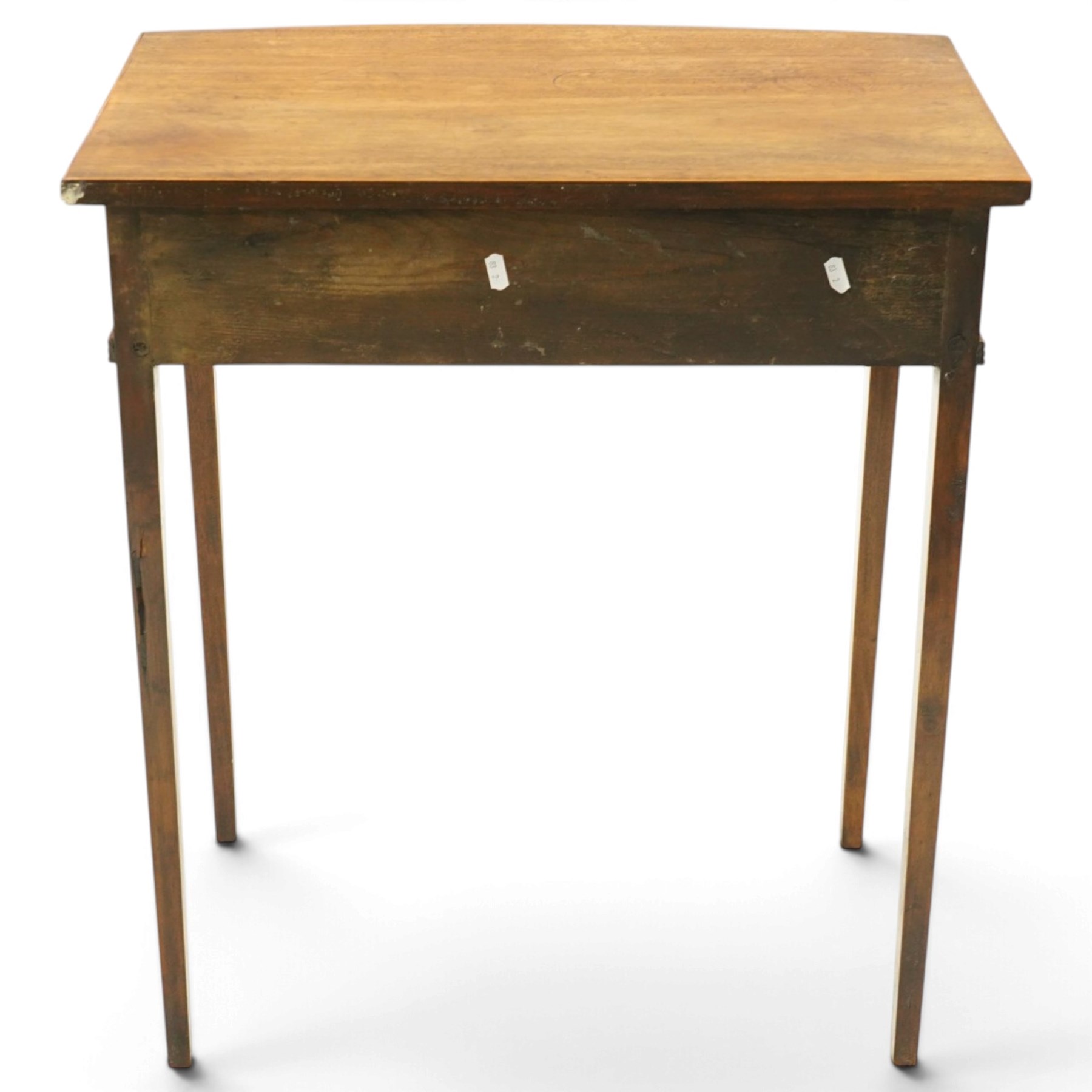 George III mahogany bowfront side table, fitted with single frieze drawer with brass lion-mask handles and twin candle-rests to each side, lower reeded edge on square tapering supports