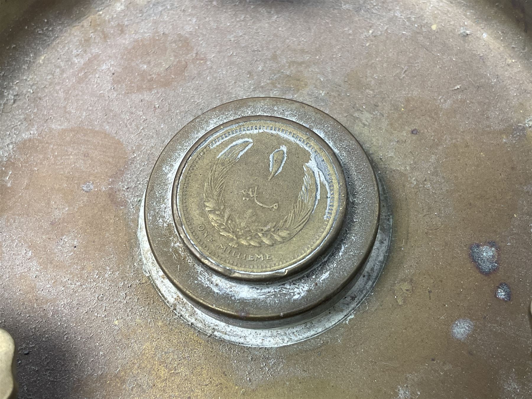 Four post-WW2 'silver' medallions of Adolf Hitler/German interest, two depicting Von Hindenburg also; and pair of 1960s trench art shell case bases as ashtrays mounted with Libyan Five Milliemes coins as cigarette rests (6)