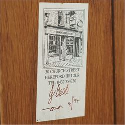 John Nethercott & Co - late 20th century hand-made oak 17th-century design chest of drawers, rectangular pegged and planked top above scrollwork carved frieze concealing two drawers, over three drawers, all with raised rectangular moulding and drop handles, raised on stile feet, the back with dated label for John Nethercott & Co