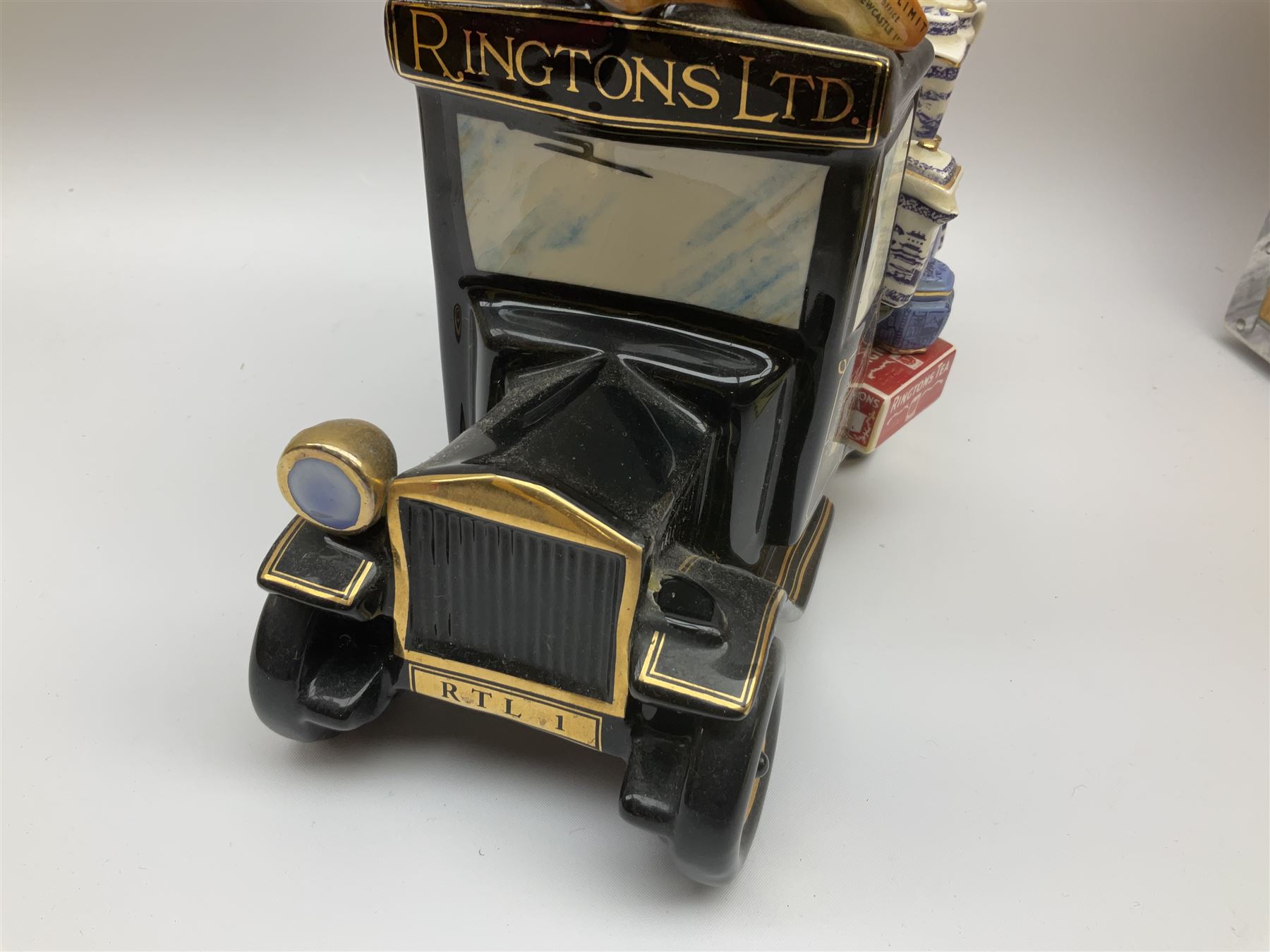 Ringtons novelty teapots, comprising the Ringtons Delivery Van teapot, and the Tea Merchant teapot, both with boxes and certificates of ownership.