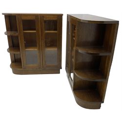 Pair of mid-20th century oak bookcases, rectangular form with curved ends, enclosed by glazed doors and fitted with shelves
