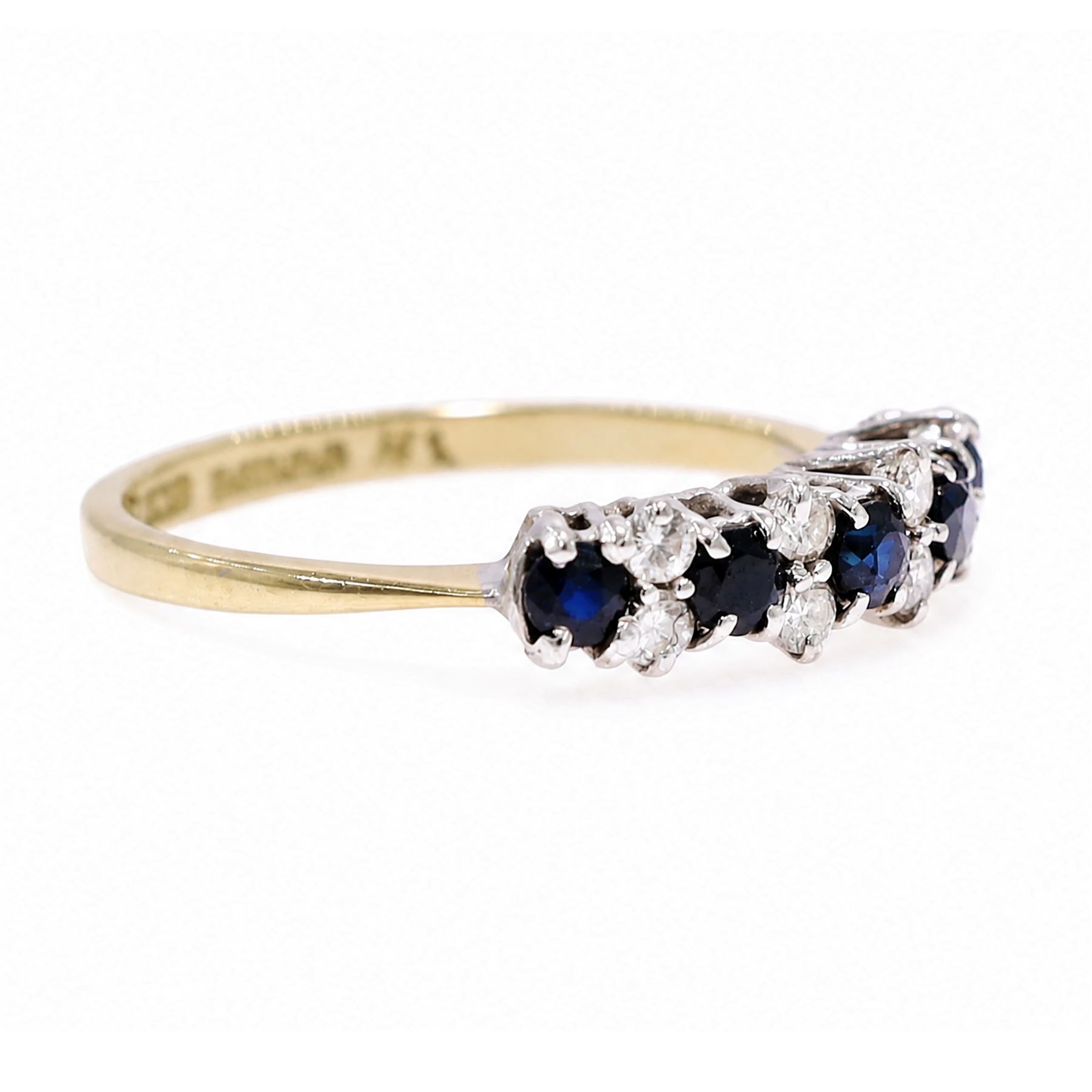18ct gold sapphire and diamond ring, five round cut sapphires, spaced by two two round round brilliant cut diamonds, Birmingham 1983, total diamond weight approx 0.25 carat