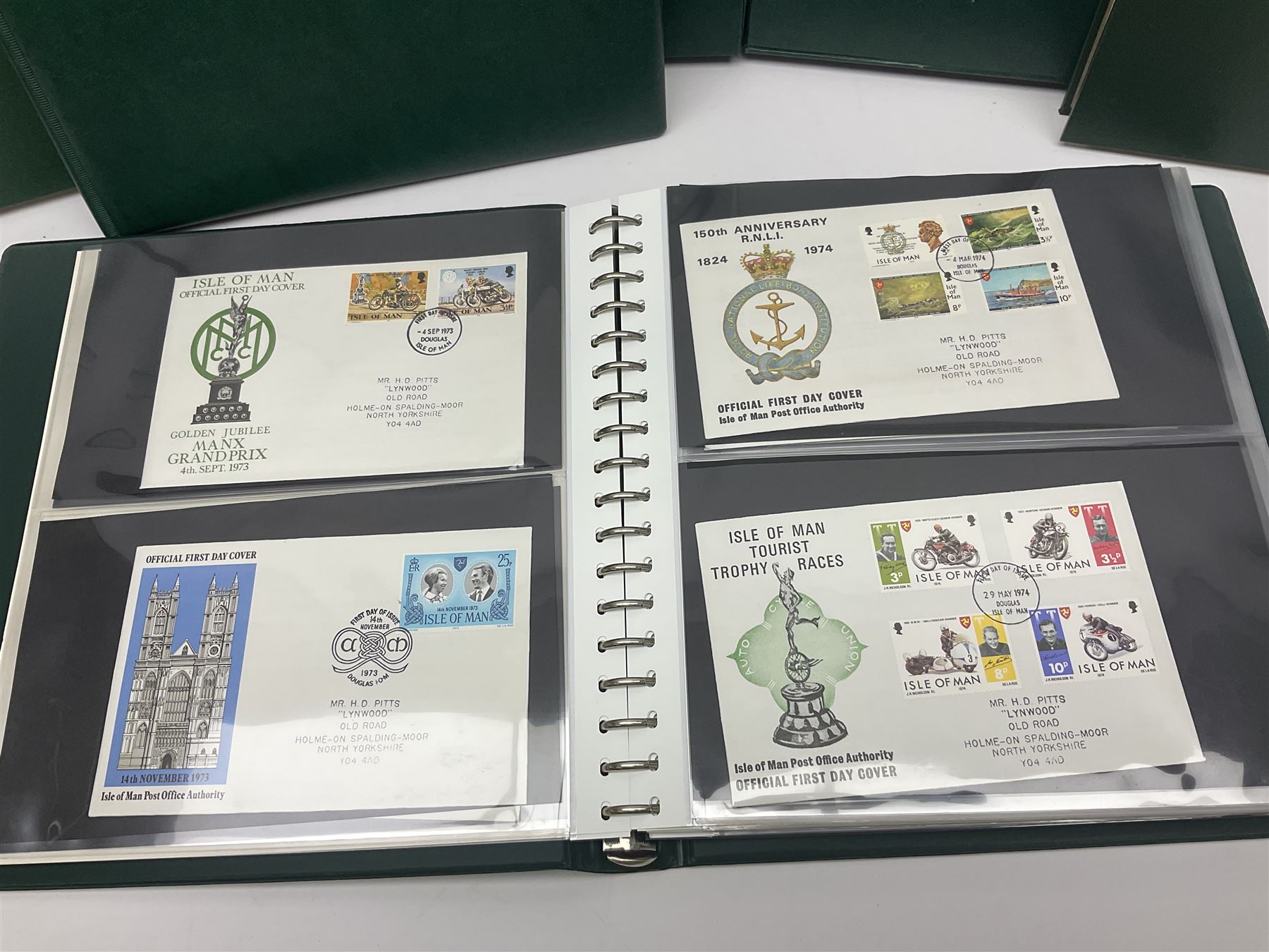 Mostly Queen Elizabeth II Great Britain and Isle of Man stamps including mint examples, housed in various albums, stockbooks and loose, in one box