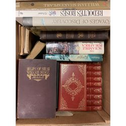 Three boxes of miscellaneous books.