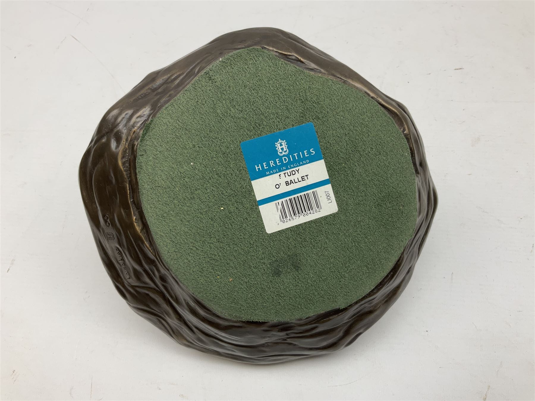 Heredities bronzed figure by Laura Lain, modelled as a seated ballet dancer, H14.5cm