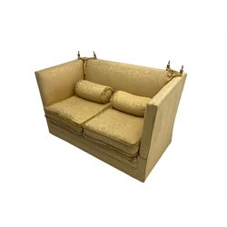 Edwardian knole design drop-arm two seat sofa, upholstered in yellow damask fabric with sprung back and seat and matching bolster cushions