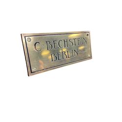 Carl Bechstein - late 19th century German overstrung upright piano, in a model 4 Arts and Crafts case designed by Walter Cave, with a lattice music desk and fretted silk backed front panel, brass hinged case lid and key fall with square tapered candle holders and circular sconces, iron frame, serial number 52187 (1899-1900), with an under damper action, 85 ebony and ivory keys, sustain and una corda pedals, original action, stringing, dampers, and action return straps, registered case number 328639, USA patent 24805.

This item has been registered for sale under Section 10 of the APHA Ivory Act