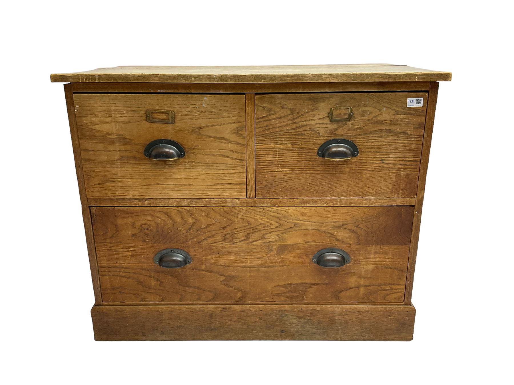 Early to mid-20th century oak chest, fitted with two short drawers over one long drawer, raised on plinth base