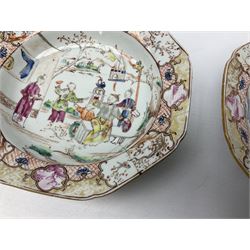 Two 19th century Chinese dishes with painted polychrome decoration, depicting joyous figures in a garden setting in circular central recess surrounded by border with lattice, blossoming branches and gilt panel decoration, D15.5cm