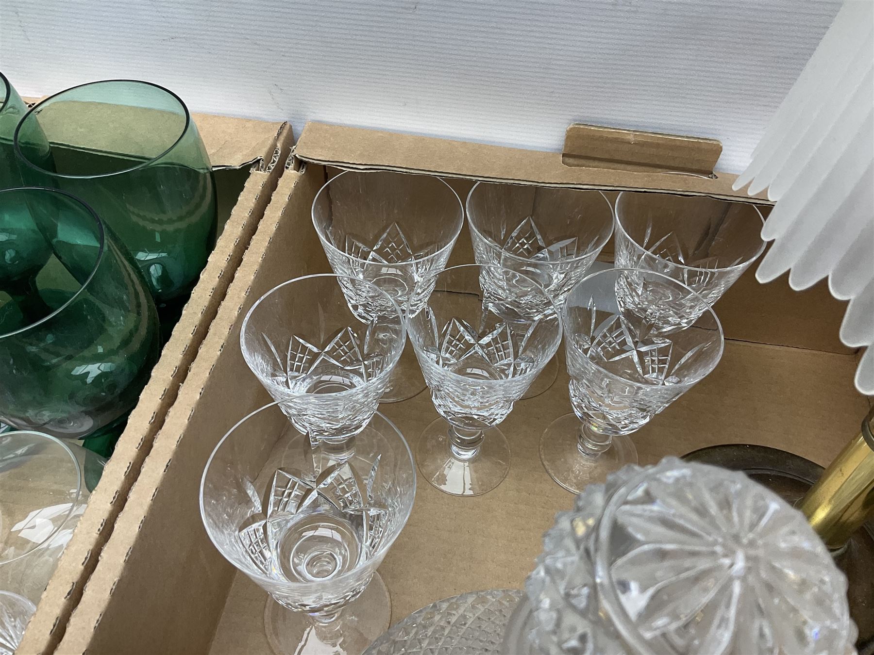 Quantity of glassware to include Mats Jonasson koala paperweight, set of six Stuart drinking glasses, seven green wine glasses with ovoid bowls, decanter, brass lamp etc