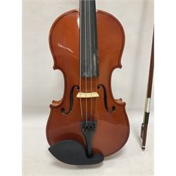 Full size violin with a maple case and ebonised fingerboard and fittings, with bow and hard case Length 60cm