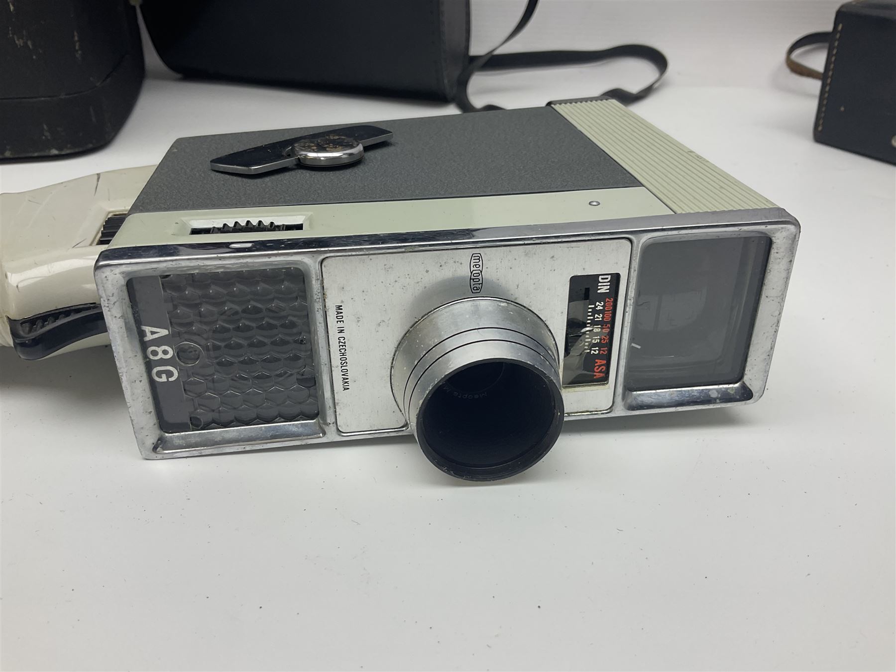 Beiretta Junior II camera body, with 'Meritar 29/45' lens, Bell & Howell Autoload cine camera and other camera equipment 