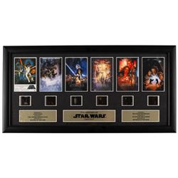 Four Cards Inc Star Wars The Movie Poster Collection prints, comprising Episode I Attack of the Clones, A New Hope, Return of the Jedi and The Empire Strikes Back, all framed, H37cm, together with a Rye by Post The History of Star Wars Original Filmcell collection, with certificate of authenticity verso