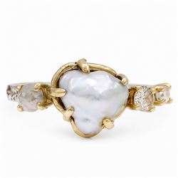 Silver and 9ct gold pearl and diamond ring by Susi Hines, single Keshi pearl set with a si...