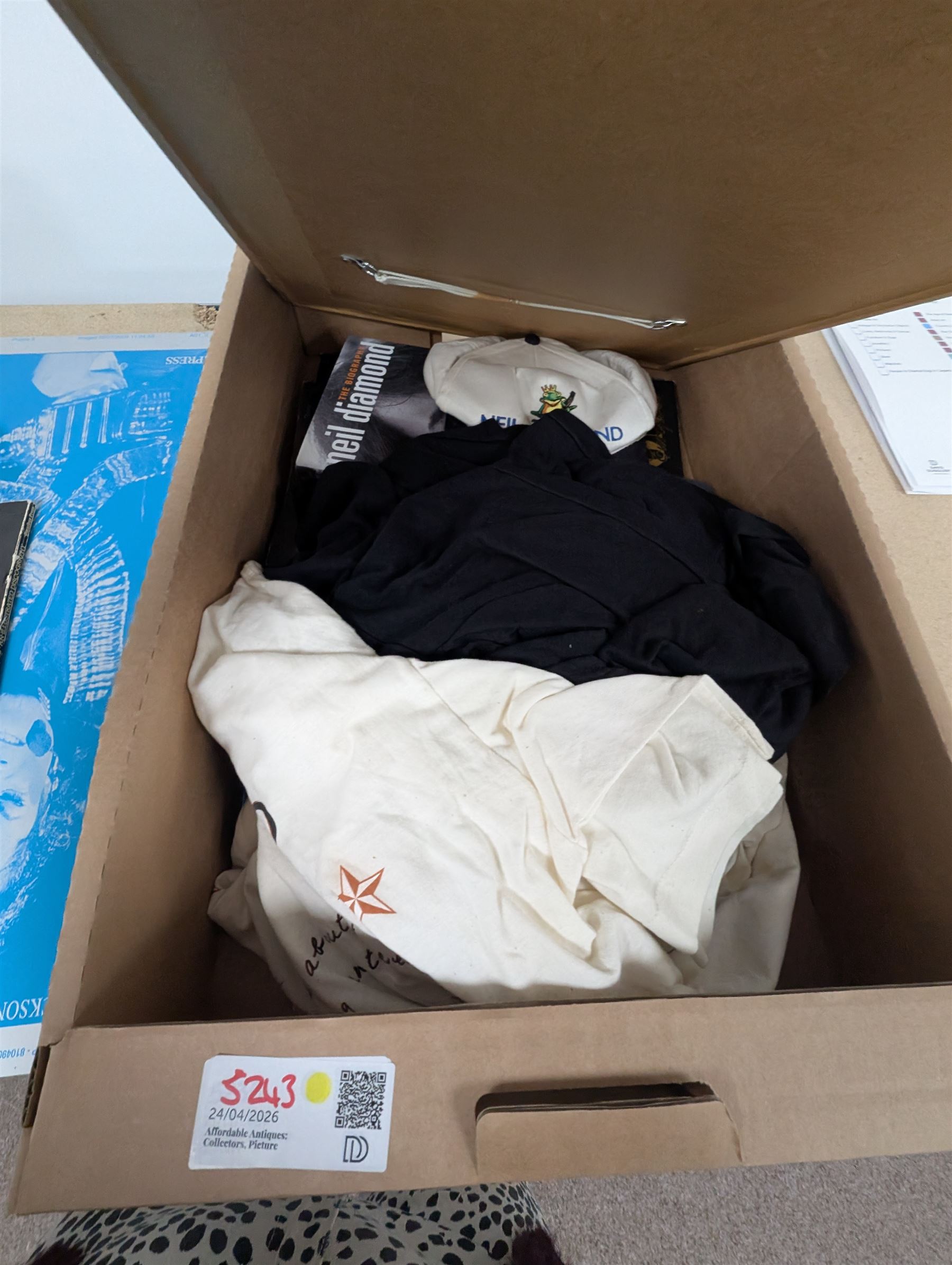 Collection of music memorabilia, including signed Peter Hook memorabilia, Status Quo, Rolling Stones, Neil Diamond, Joy Division tshirts, posters, books, etc