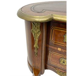 19th century French Kingwood kidney shaped kneehole desk, inset leather writing surface with a moulded brass edge, fitted with single frieze drawer flanked by two short drawers, the facias inlad with chequered satinwood banding, canted uprights with foliate cast gilt metal mounts, raised on cabriole supports