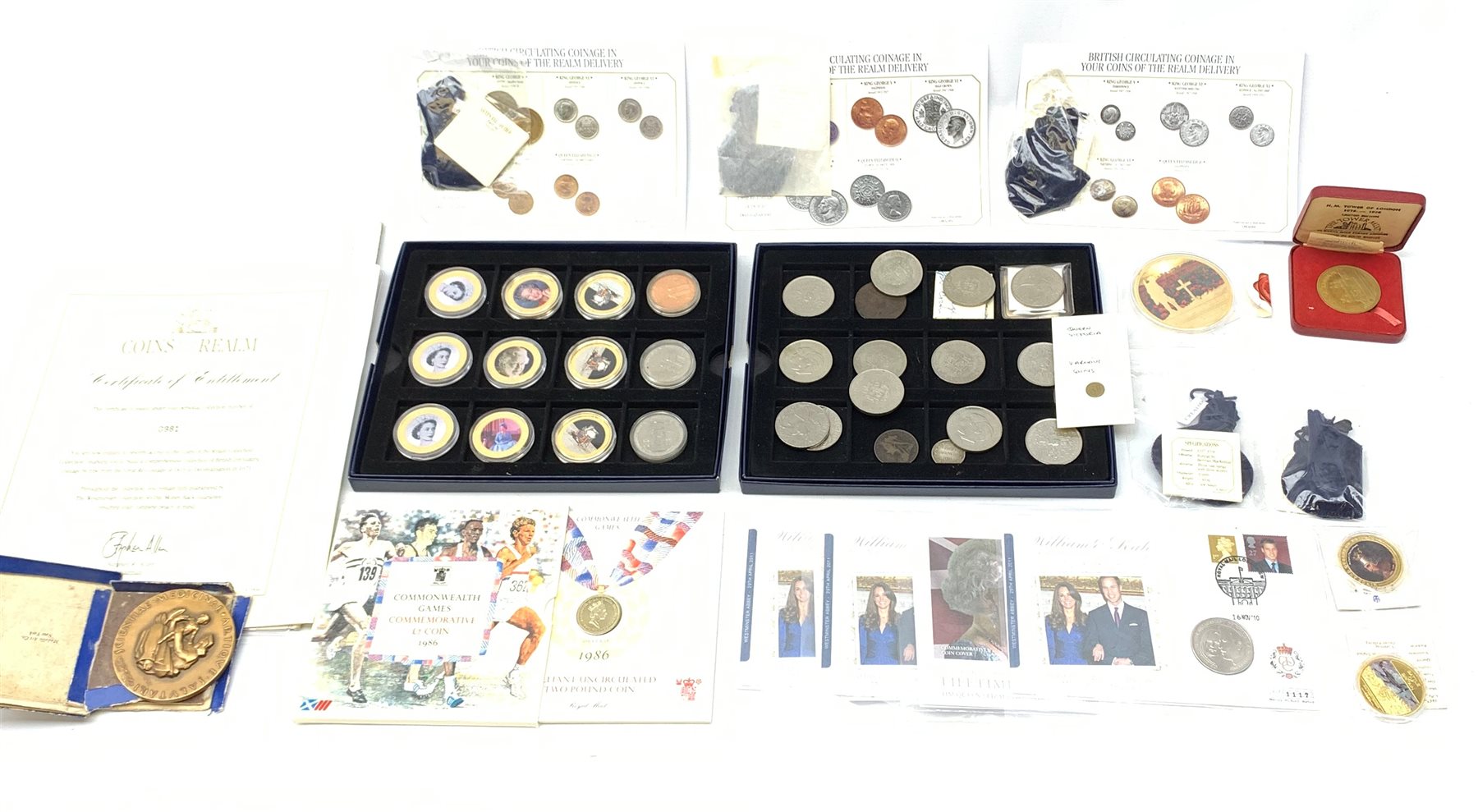 Mostly modern commemorative coins including United Kingdom brilliant uncirculated 1986 commonwealth games two pound coin, coin covers, 'Remembrance Day 11th November' commemorative coin, commemorative crowns etc